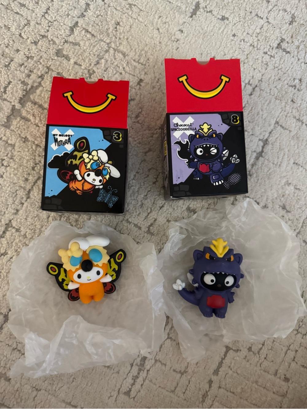 Set of 2 McDonald’s My Melody x Mothra and Chococat Space Godzilla Toys